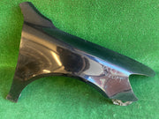 Škoda Octavia II,2 pravý blatník černý