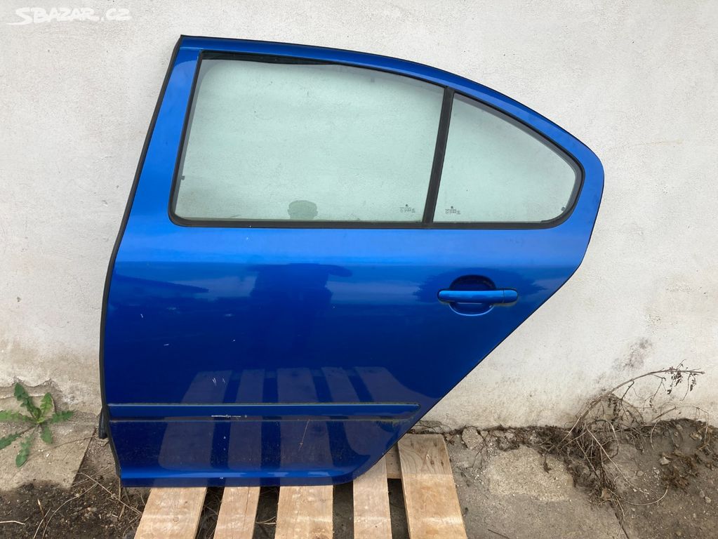 Škoda Octavia II,2 levé zadní dveře sedan