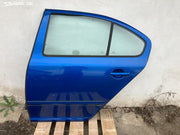 Škoda Octavia II,2 levé zadní dveře sedan