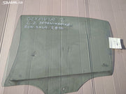 Octavia 2 levé zadní sklo dveří